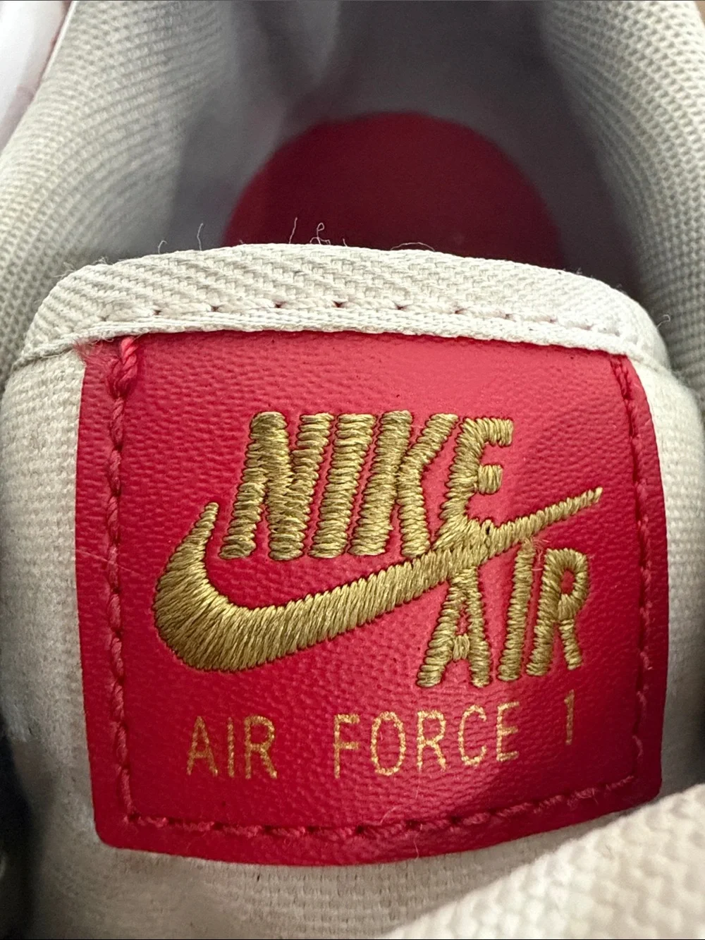 Nike Air Force 1 '07 ESS White Sneakers with Red Swoosh